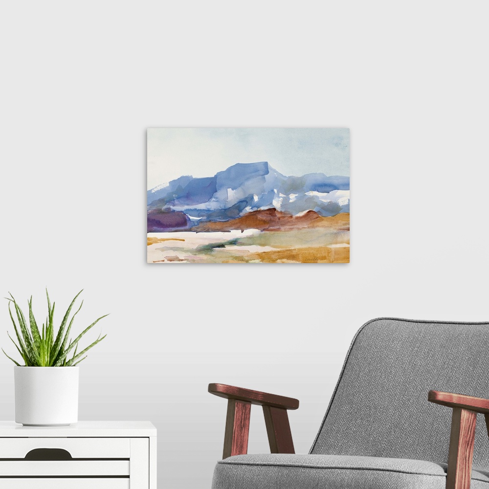 A modern room featuring Watercolor landscape painting of a mountain rising over a field.