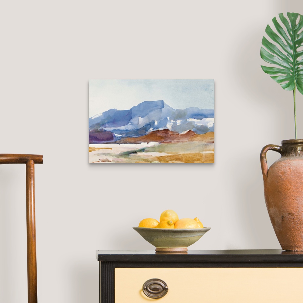 A traditional room featuring Watercolor landscape painting of a mountain rising over a field.