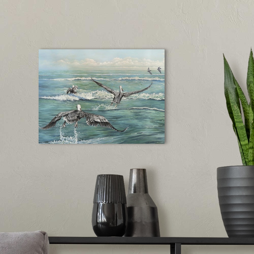 A modern room featuring Contemporary painting of a flock of pelicans flying across the water's surface.