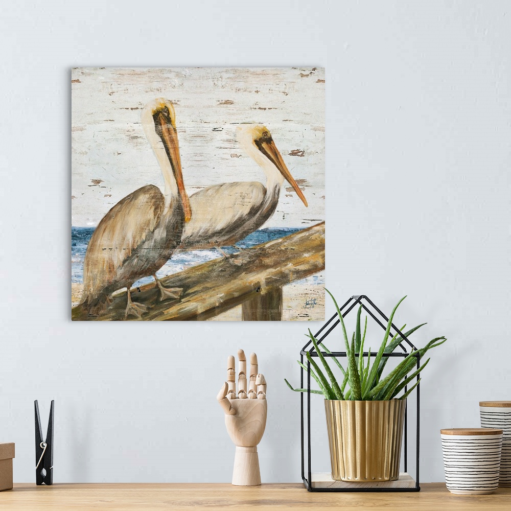 A bohemian room featuring This contemporary artwork features illustrated brush strokes of two pelicans with a distressed te...
