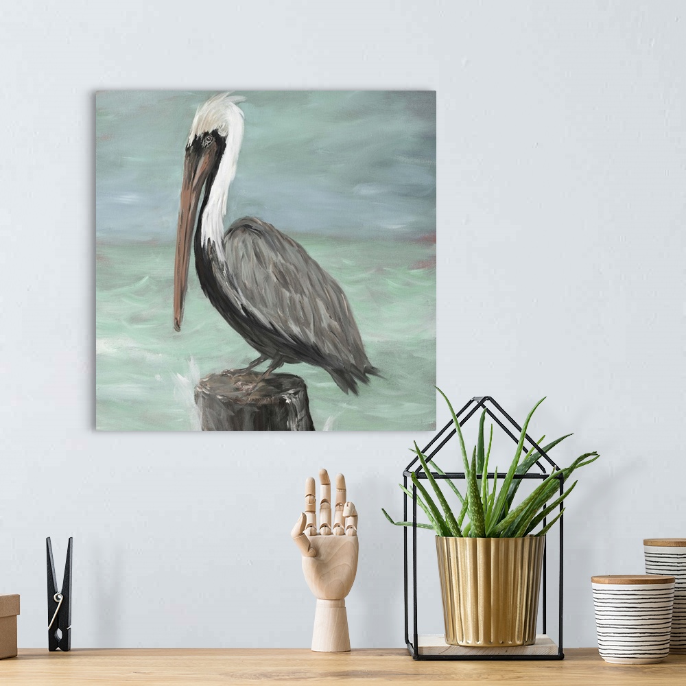 A bohemian room featuring A contemporary painting of a pelican perched on a wooden stump with the ocean waves crashing into...