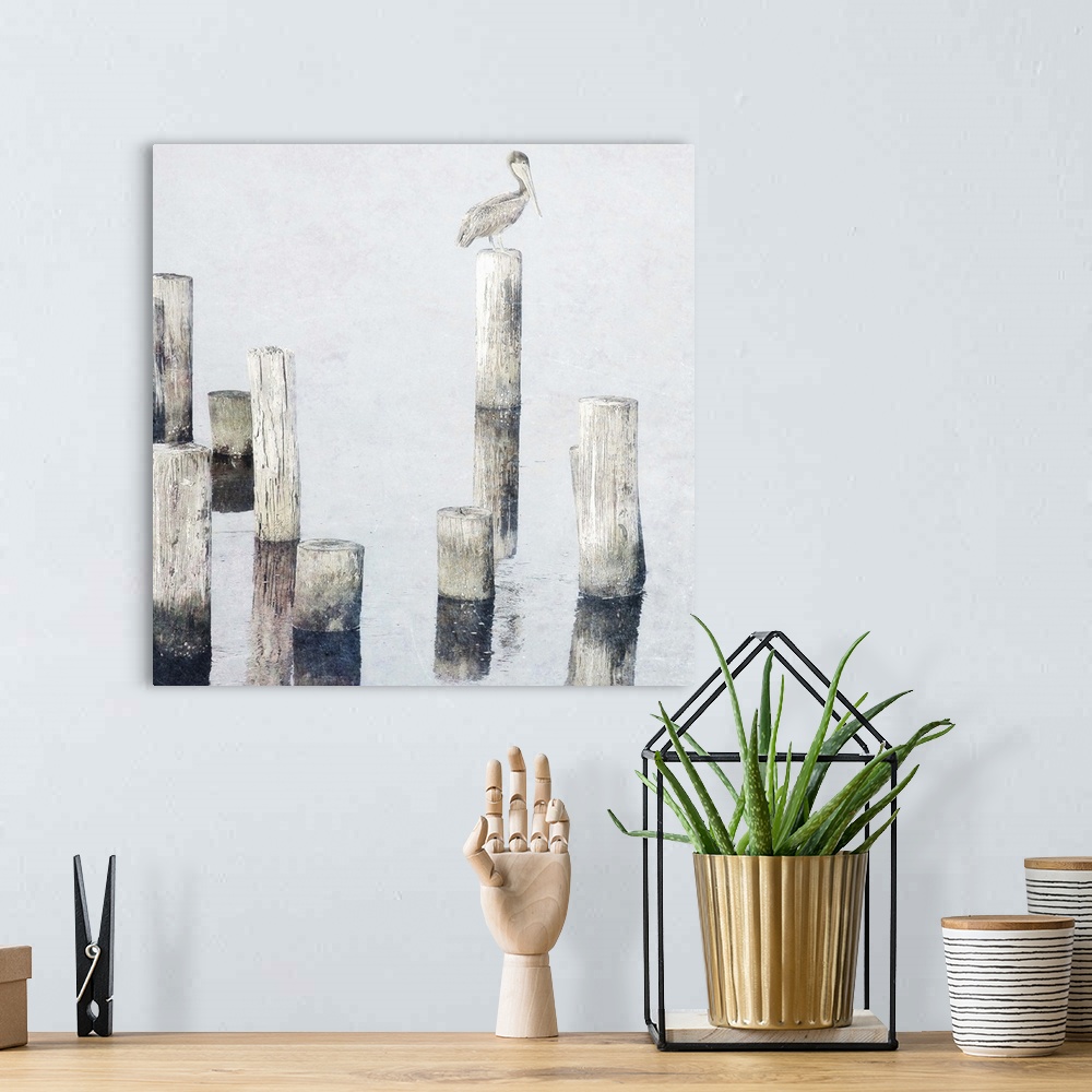 A bohemian room featuring Painting of a pelican perched on a post standing in the ocean.
