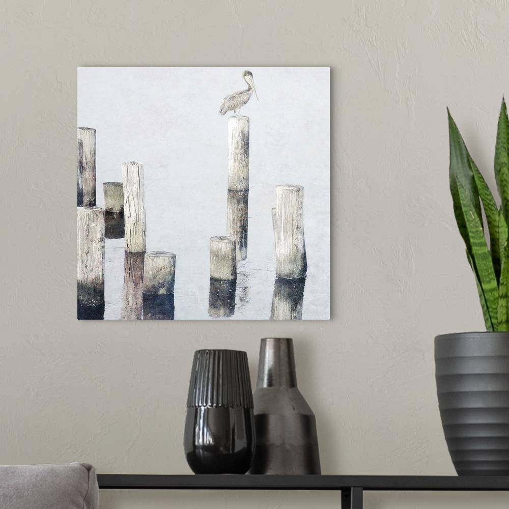 A modern room featuring Painting of a pelican perched on a post standing in the ocean.