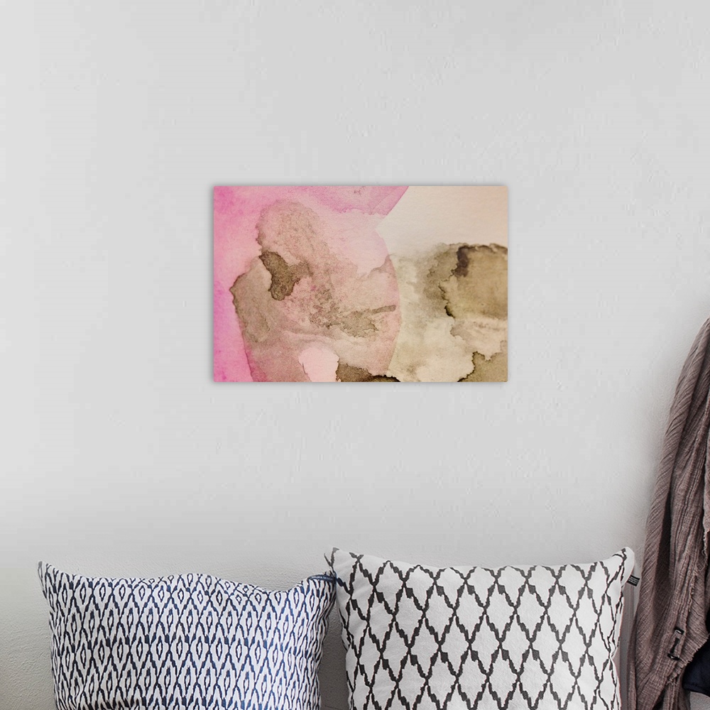 A bohemian room featuring Pink and brown abstract watercolor painting.