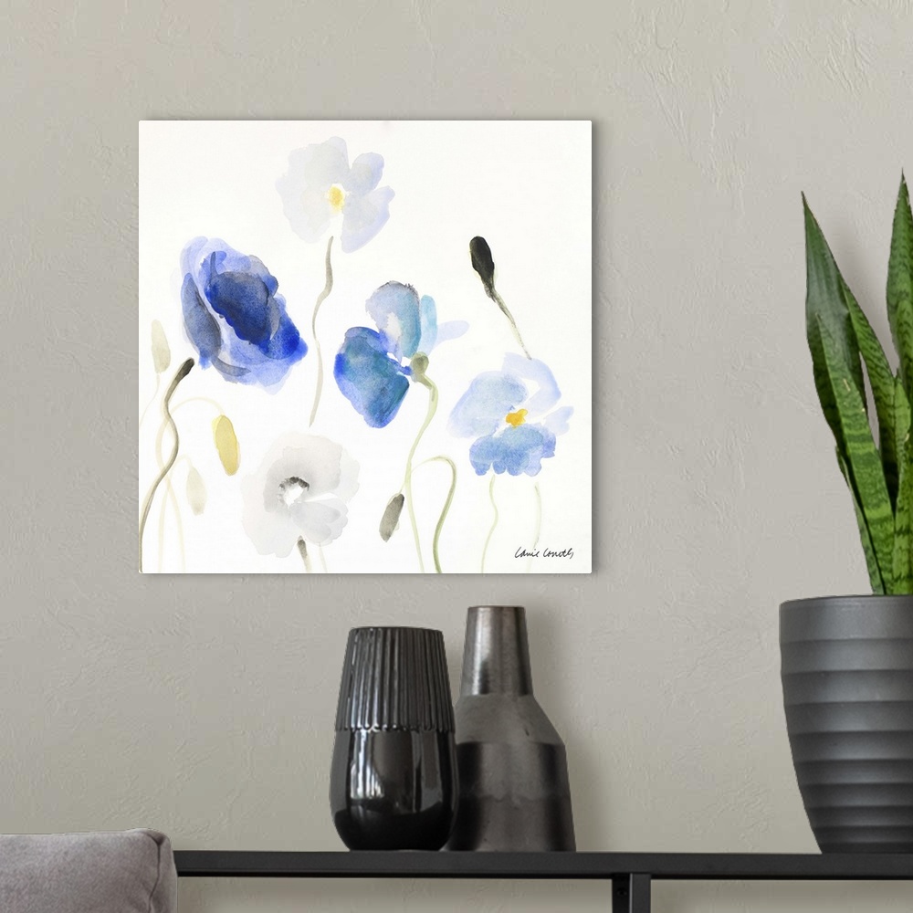 A modern room featuring A watercolor painting of blue poppy flowers.