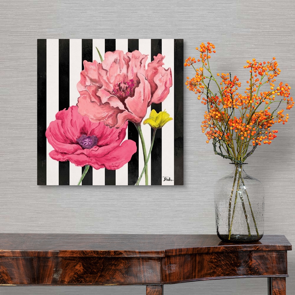 A traditional room featuring A square painting of pink poppy flowers on a black and white vertically striped background.