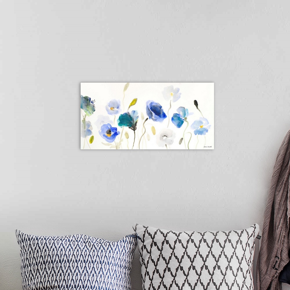 A bohemian room featuring A floral watercolor painting with flowers in different shades of blue.