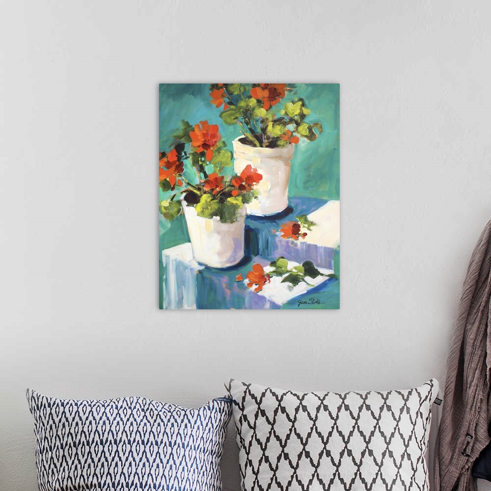 A bohemian room featuring Still life painting of two white pots with red poppies.