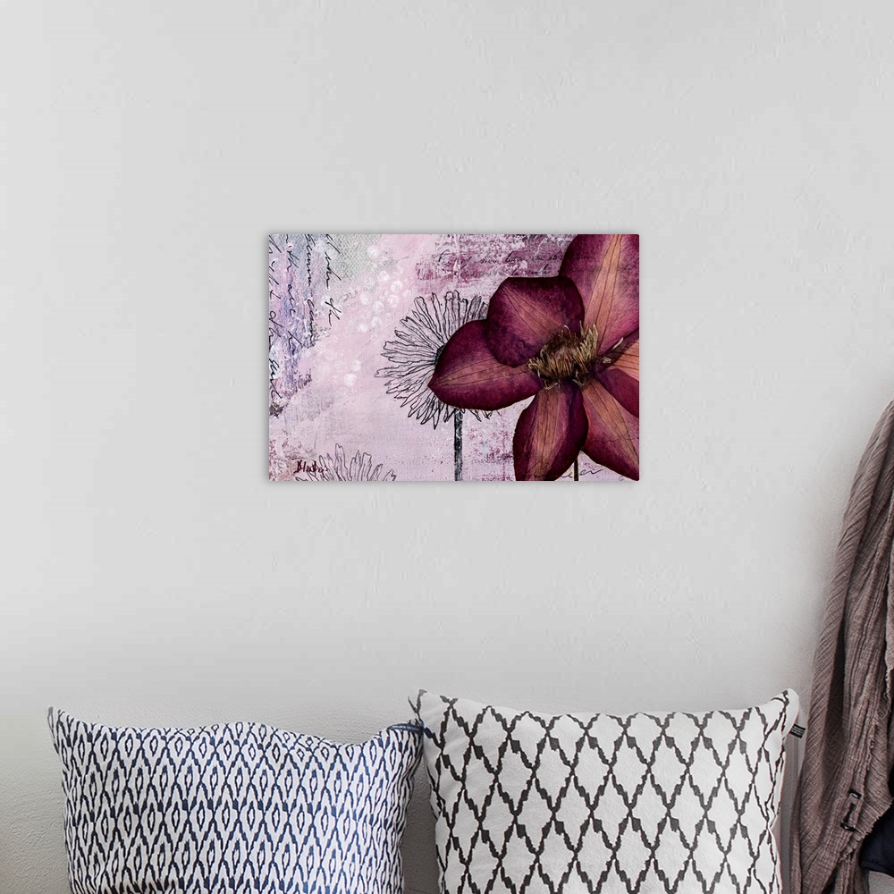 A bohemian room featuring Large dried flower atop a mixed-media background with text and floral drawings.