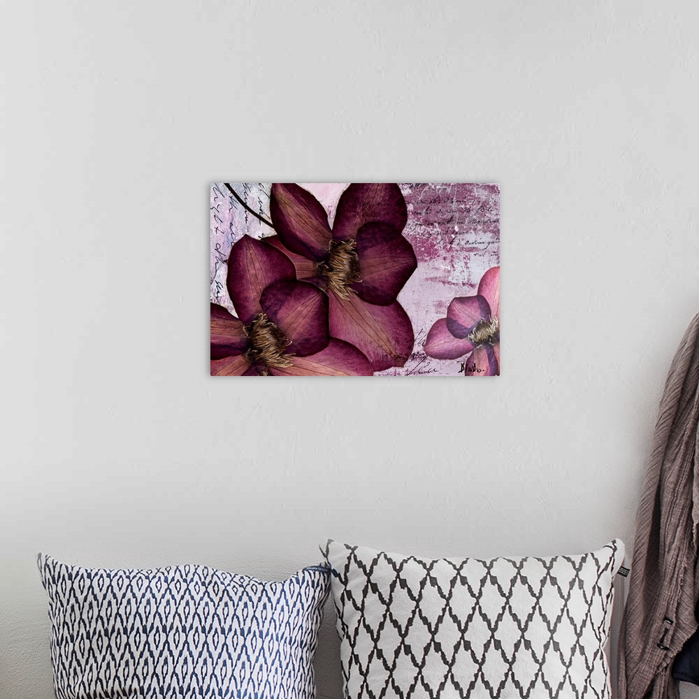 A bohemian room featuring Flower petals collaged over paint textures and hand written text.
