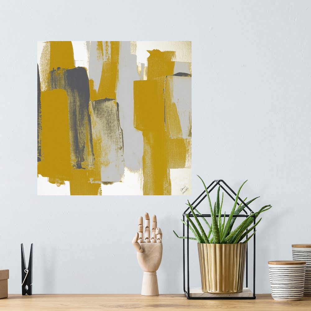 A bohemian room featuring Square abstract painting with wide vertical brushstrokes in shades of gray and deep yellow.