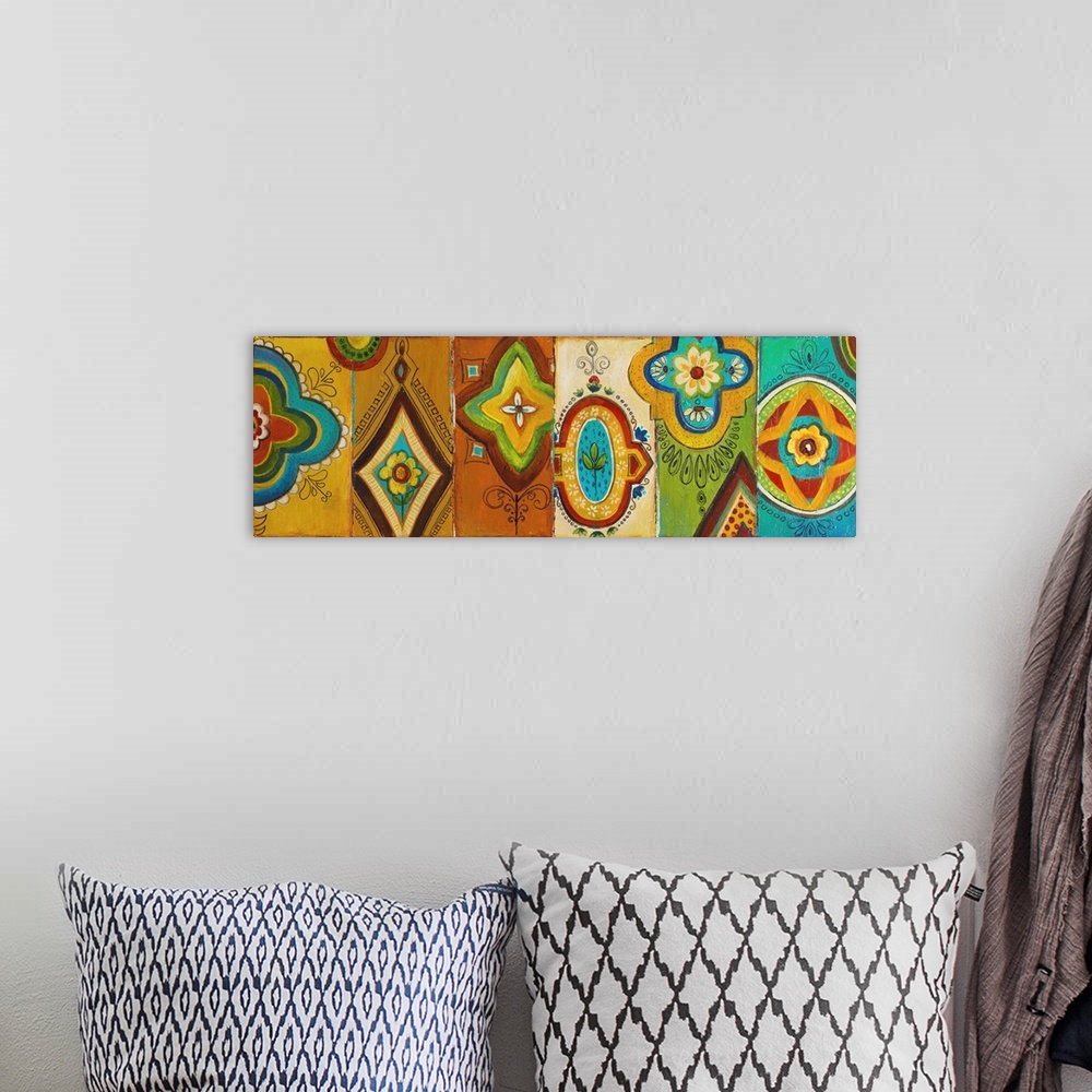 A bohemian room featuring Contemporary painting of a collection of folk art shapes on a multicolored background.