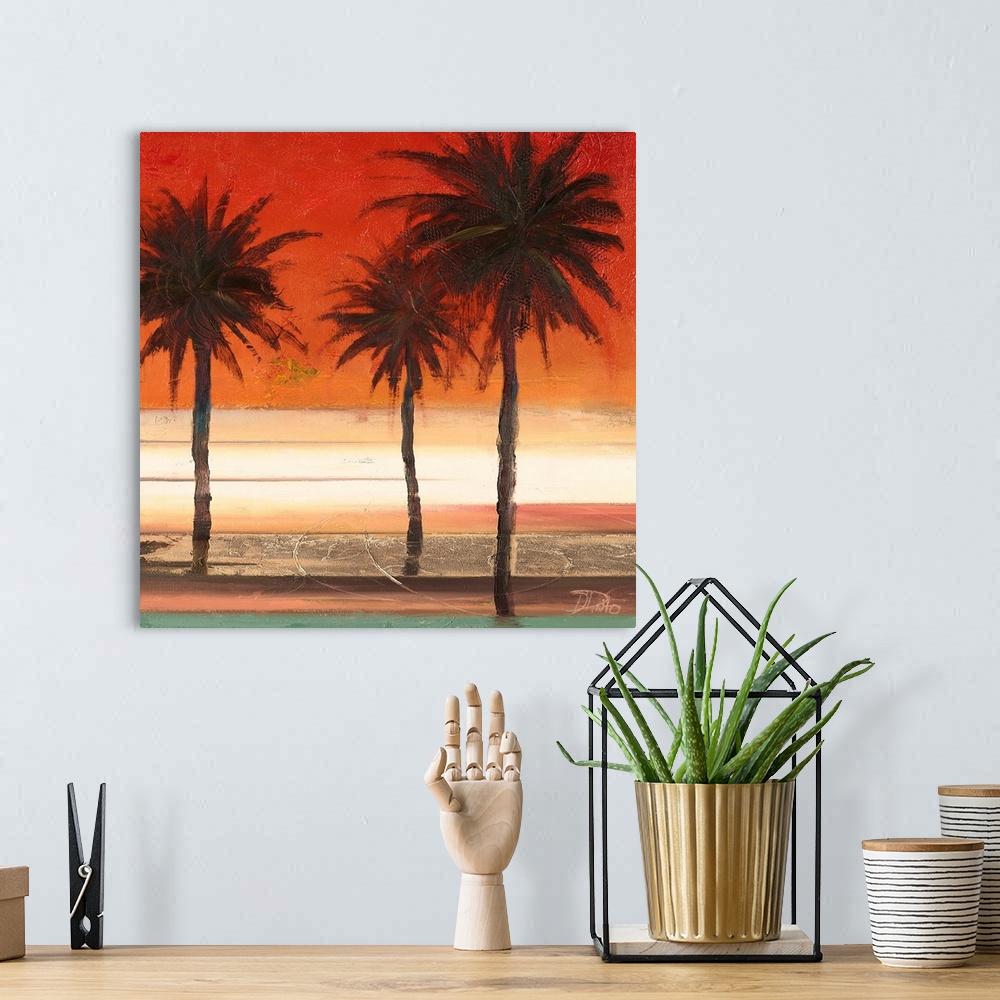 A bohemian room featuring A painting of three palm trees with a deep red and orange sunset in the background.