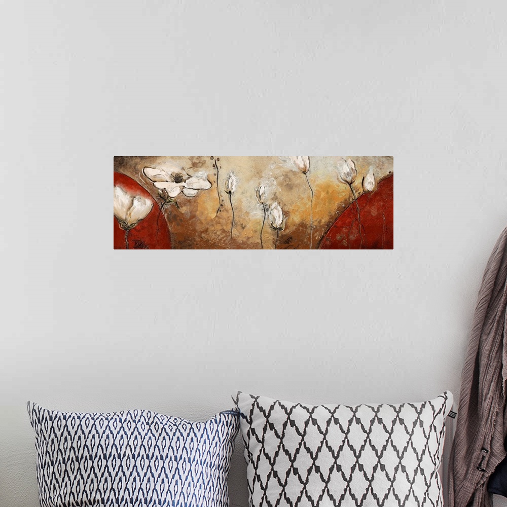 A bohemian room featuring A panoramic painting of white flowers floating in the air with large red half circles on either s...