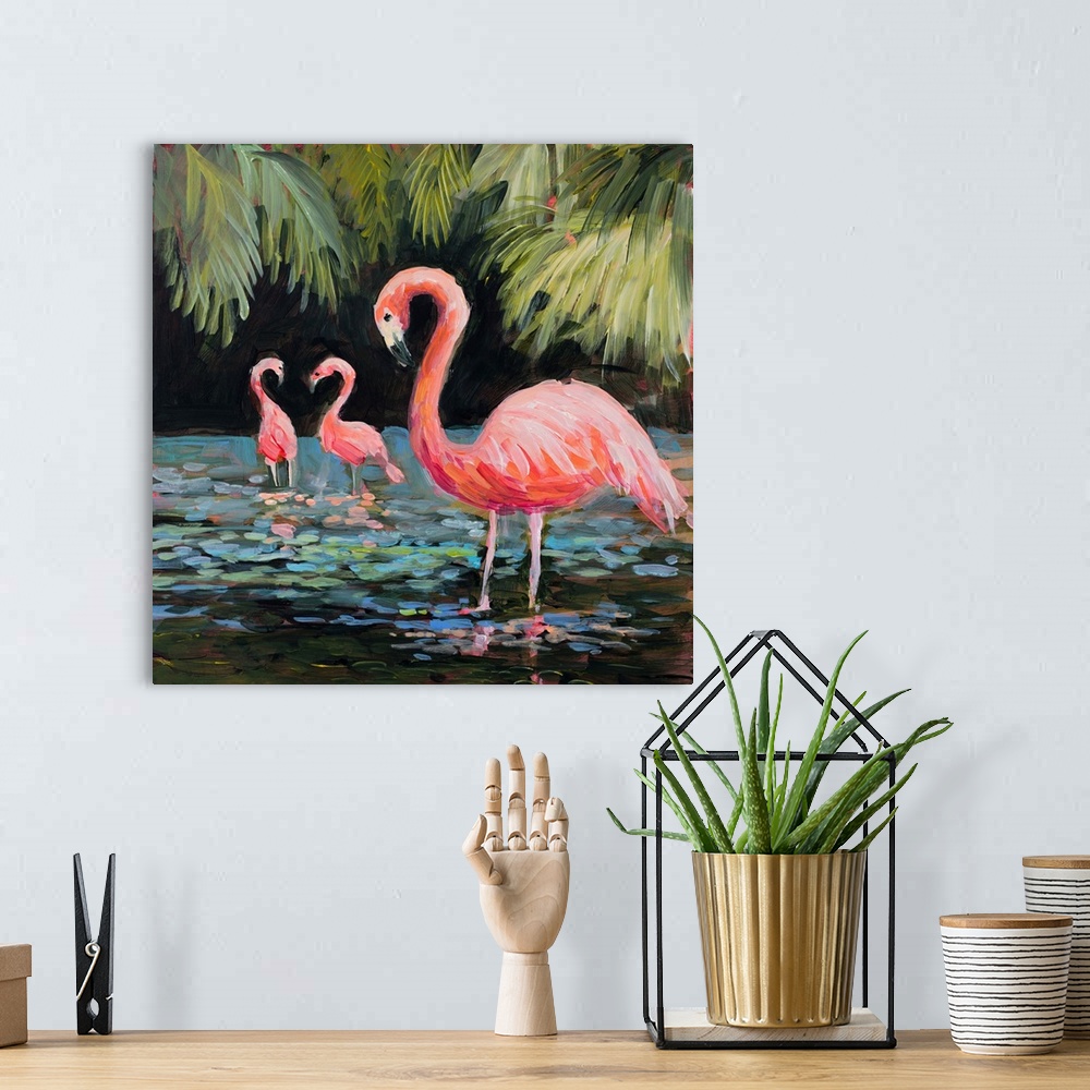 A bohemian room featuring Contemporary artwork of jovial flamingos wading in the water with tropical leaves in the background.
