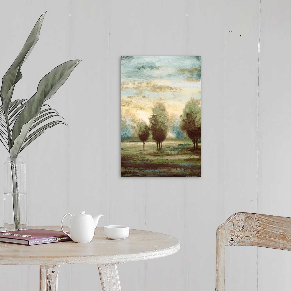 A farmhouse room featuring A vertical landscape painting of trees under a misty sky, this painting is the second half of a d...