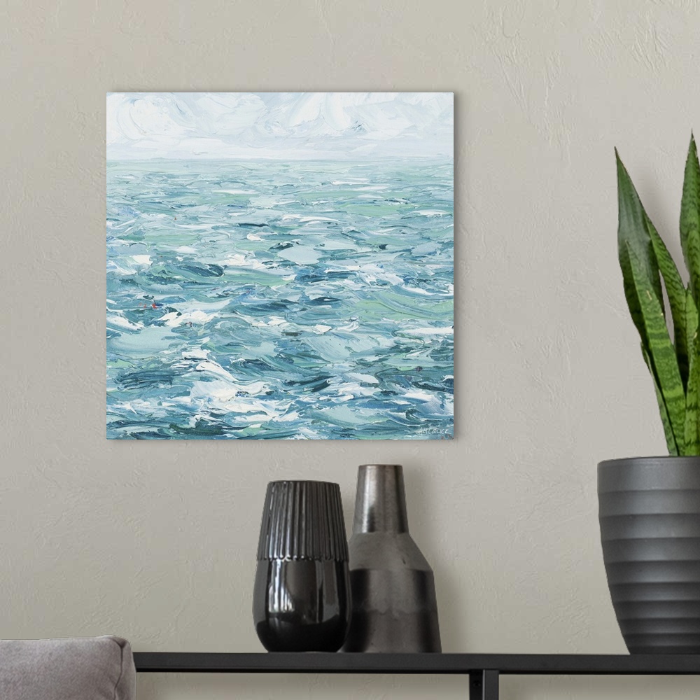 A modern room featuring Painting of ocean waves under a cloudy sky.