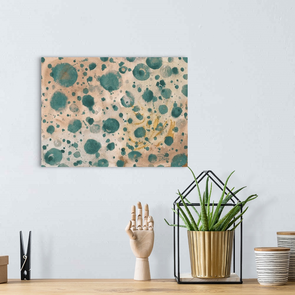 A bohemian room featuring A patterned watercolor painting with turquoise paint splatter on a tan background with hints of g...