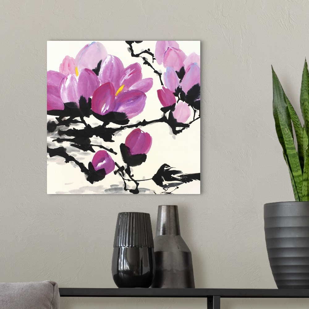 A modern room featuring A large artwork piece of cherry blossoms on black stems and branches.