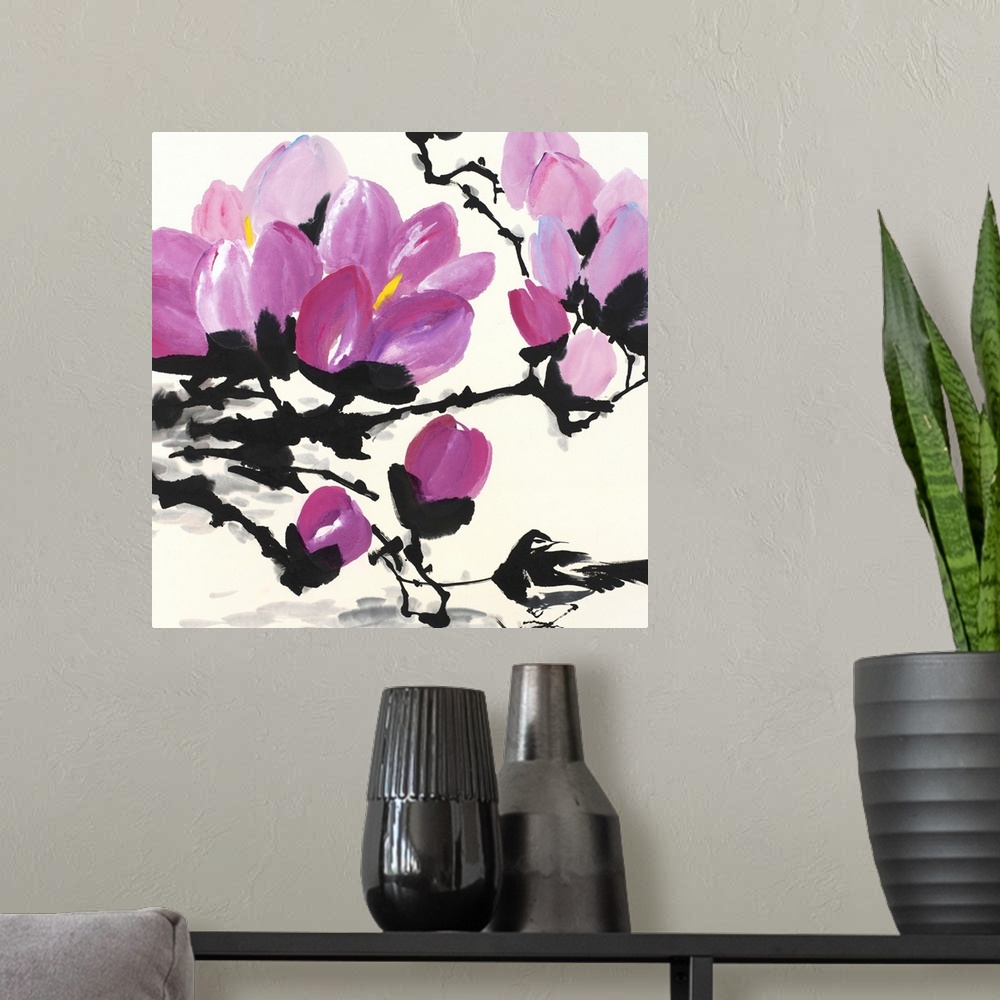 A modern room featuring A large artwork piece of cherry blossoms on black stems and branches.