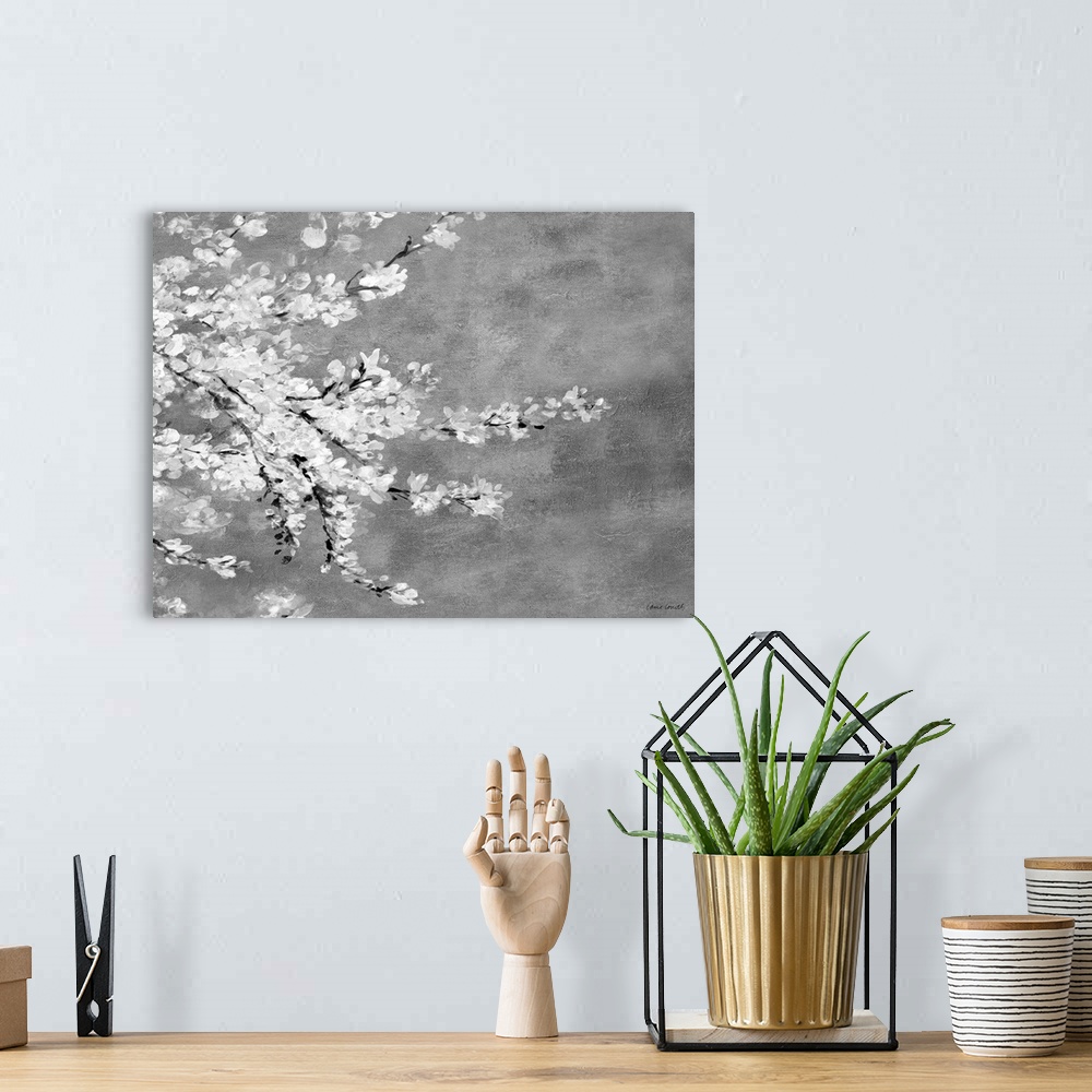 A bohemian room featuring This contemporary artwork features white blossoms on branches over a mottled background.
