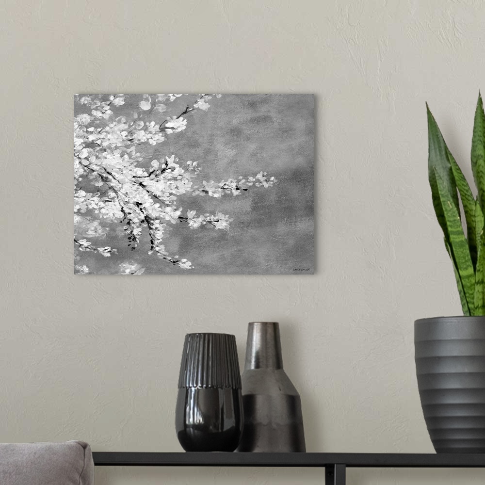A modern room featuring This contemporary artwork features white blossoms on branches over a mottled background.