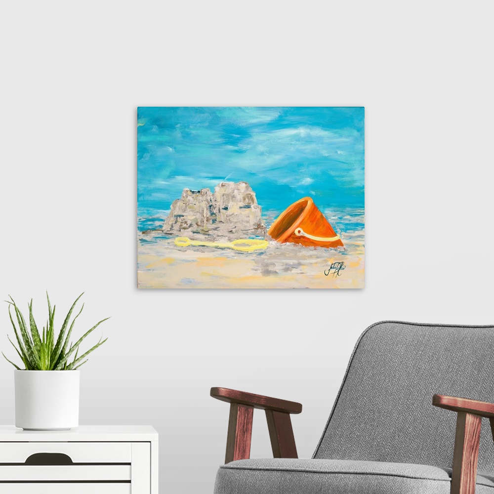 A modern room featuring Painting of a shovel and pail in the sand next to a small sandcastle.