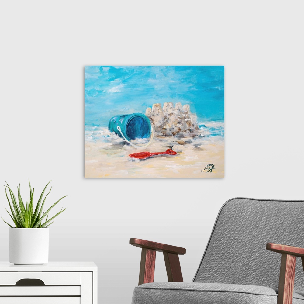 A modern room featuring Painting of a shovel and pail in the sand next to a small sandcastle.