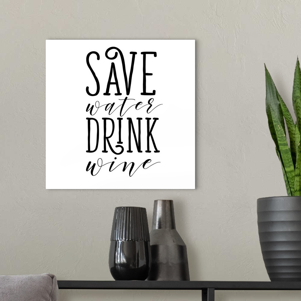A modern room featuring Save Water Drink Wine