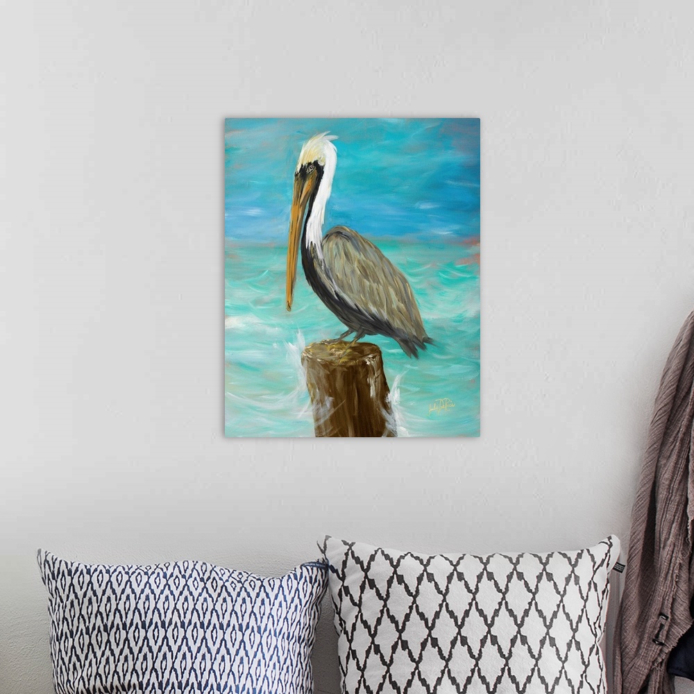 A bohemian room featuring A contemporary painting of a pelican perched on a log in the middle of the ocean with waves crash...