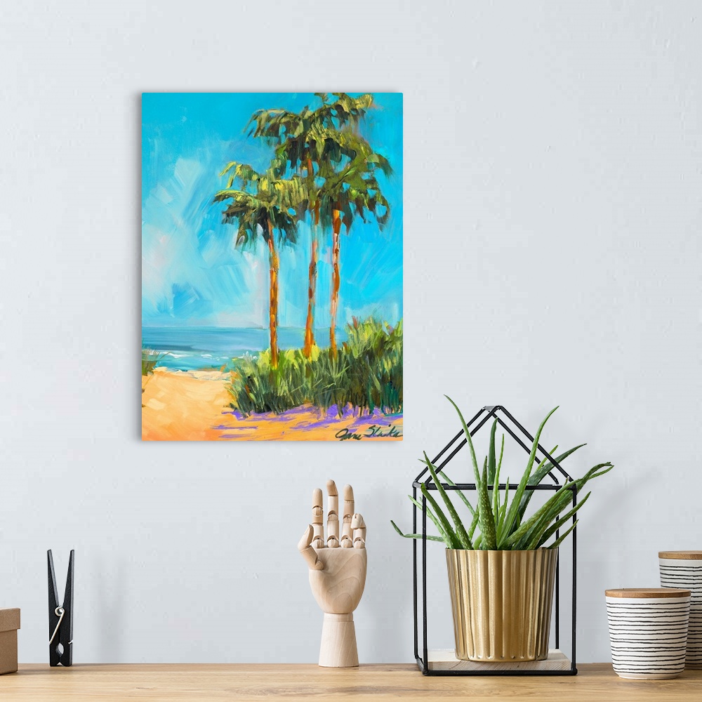 A bohemian room featuring This vertical painting by a contemporary artist shows three palm trees growing next to a tropical...