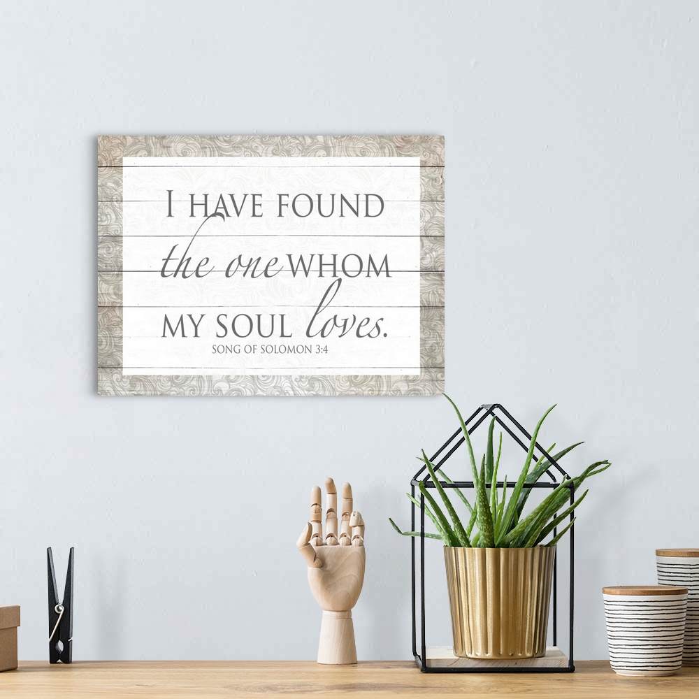 A bohemian room featuring "I Have Found the One Whom My Soul Loves." Song of Solomon 3:4 on a decorative wood paneled backg...