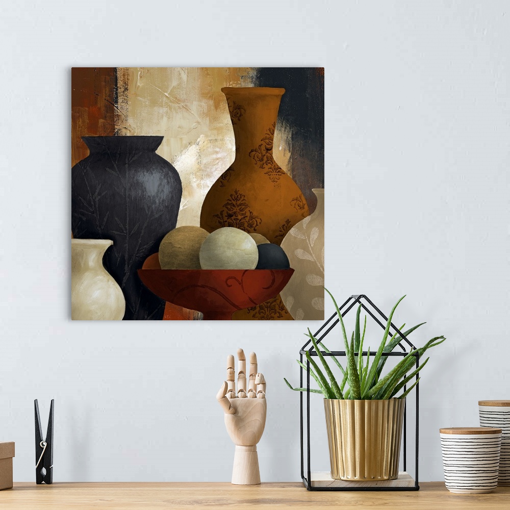 A bohemian room featuring A piece of contemporary artwork that has multiple vases of different shapes and sizes with variou...