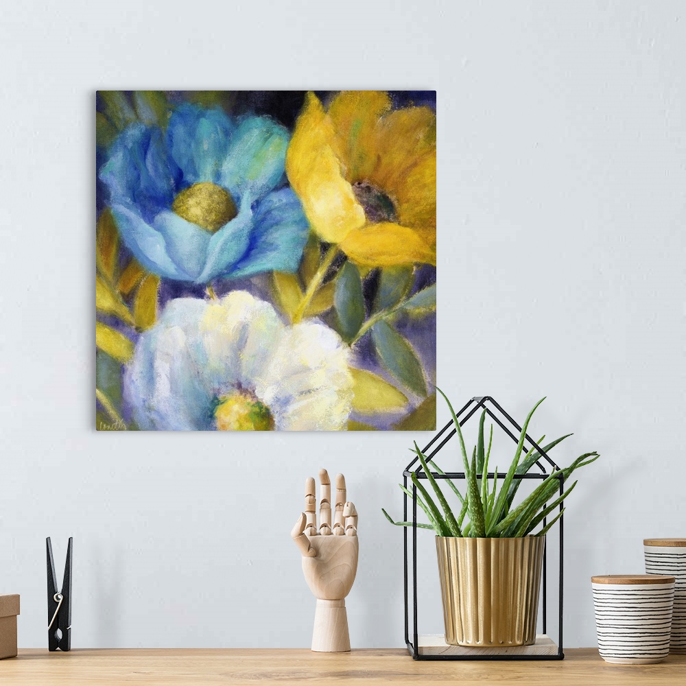 A bohemian room featuring Contemporary artwork of three large flowers in blue, yellow, and white.