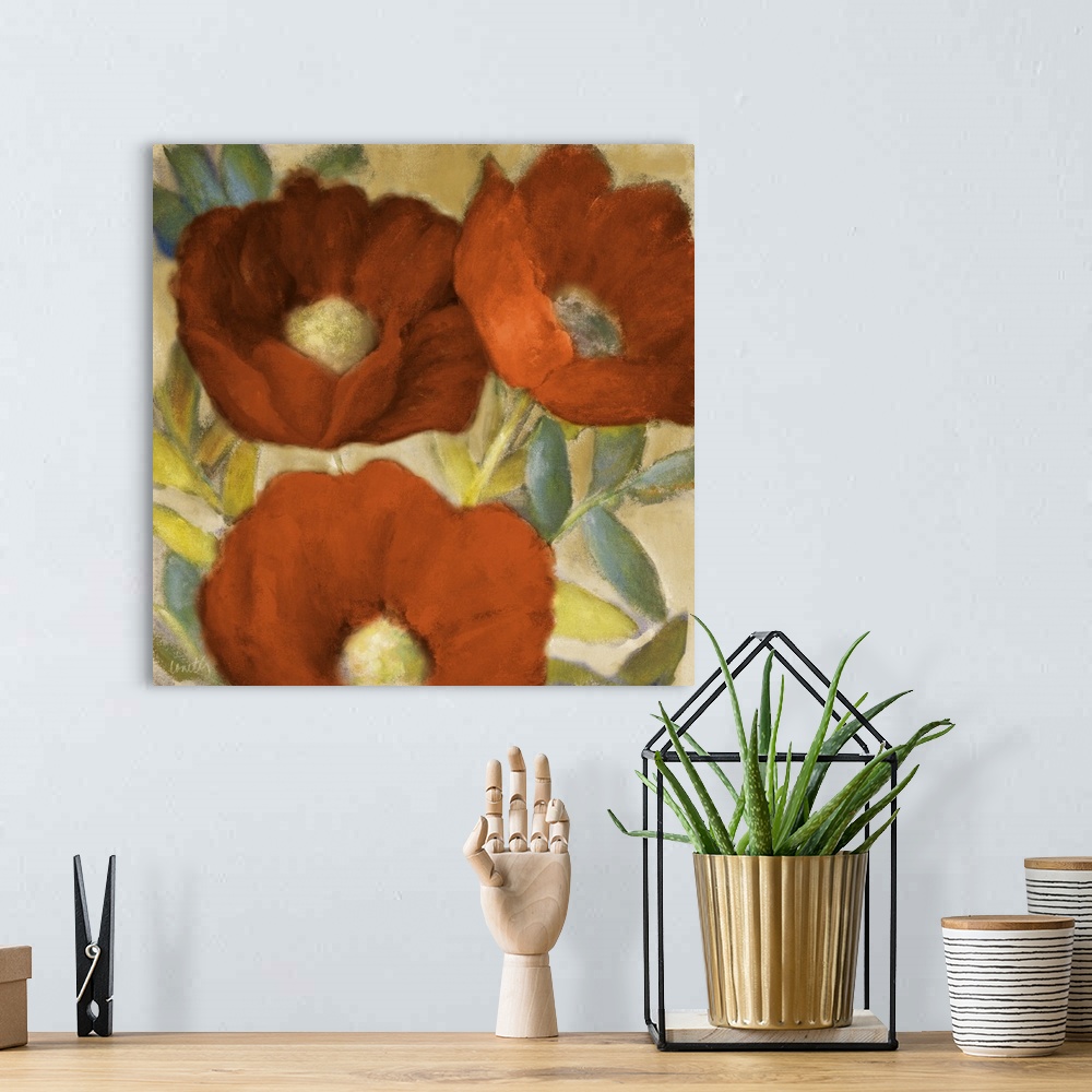 A bohemian room featuring Contemporary artwork of three large flowers in red.