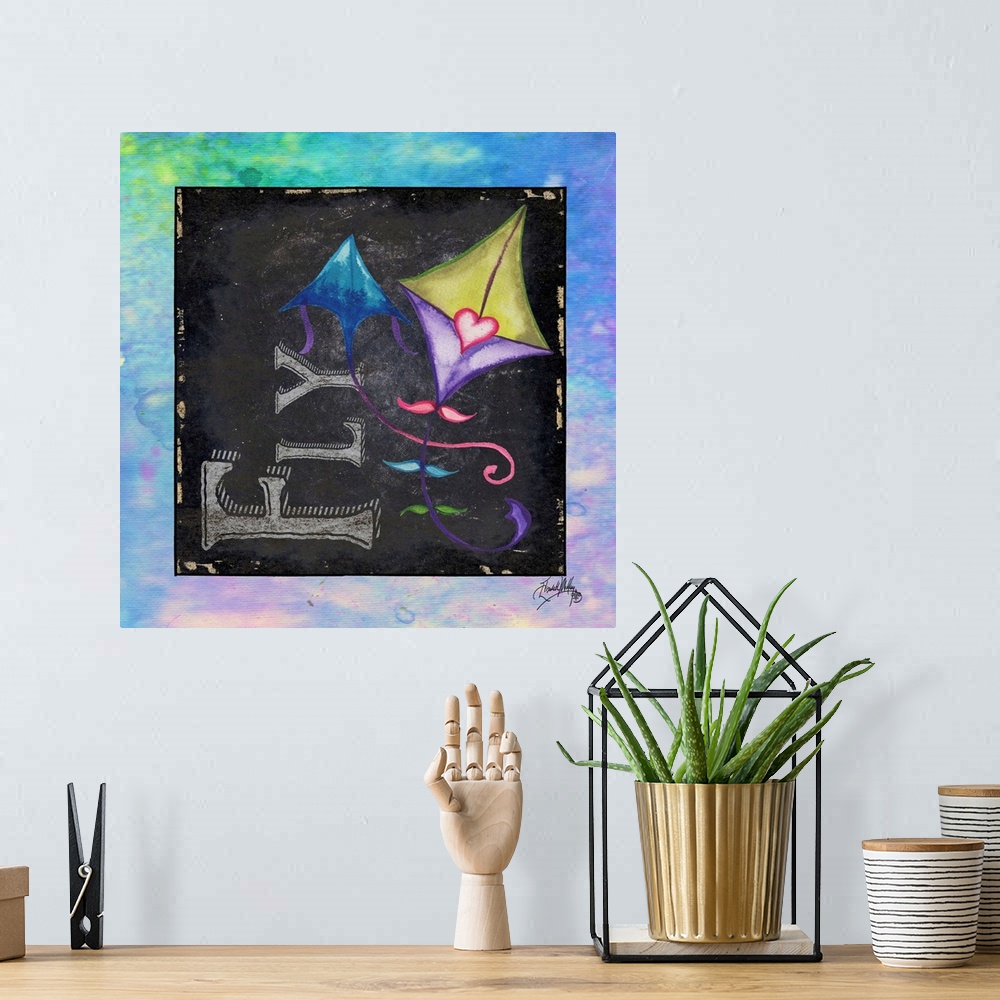 A bohemian room featuring Square painting with a blue, green, and purple designed background and a black chalkboard square ...