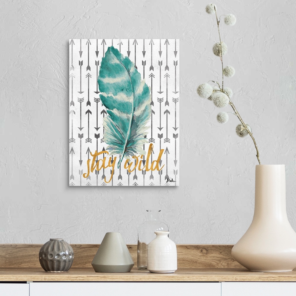 A farmhouse room featuring A blue and white striped feather with arrows on the background and the phrase "stay wild" written...