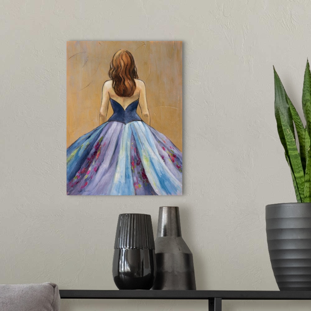 A modern room featuring Contemporary artwork of a back view featuring a woman wearing a blue dress with flowers.