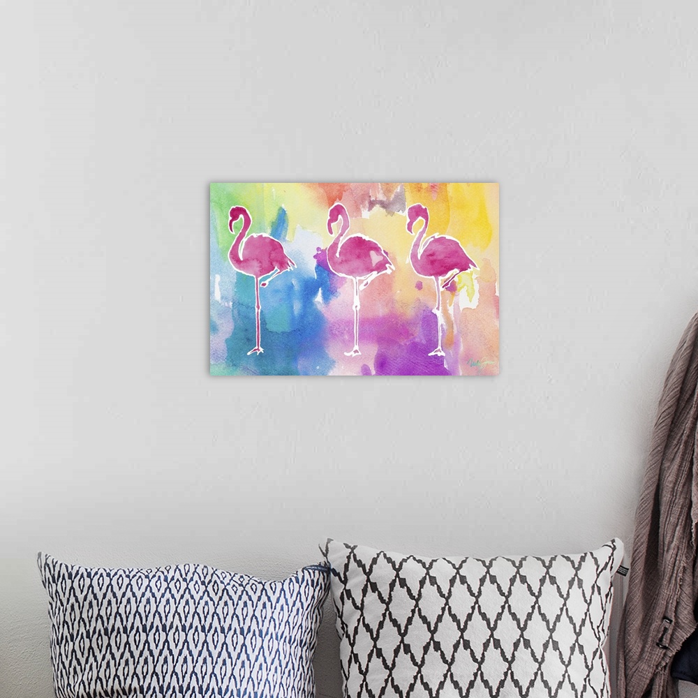 A bohemian room featuring Watercolor painting of three pink flamingo silhouettes on a background made with all of the color...