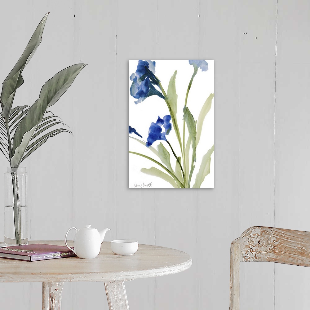A farmhouse room featuring Watercolor painting of blue flowers on green stems against a white background.