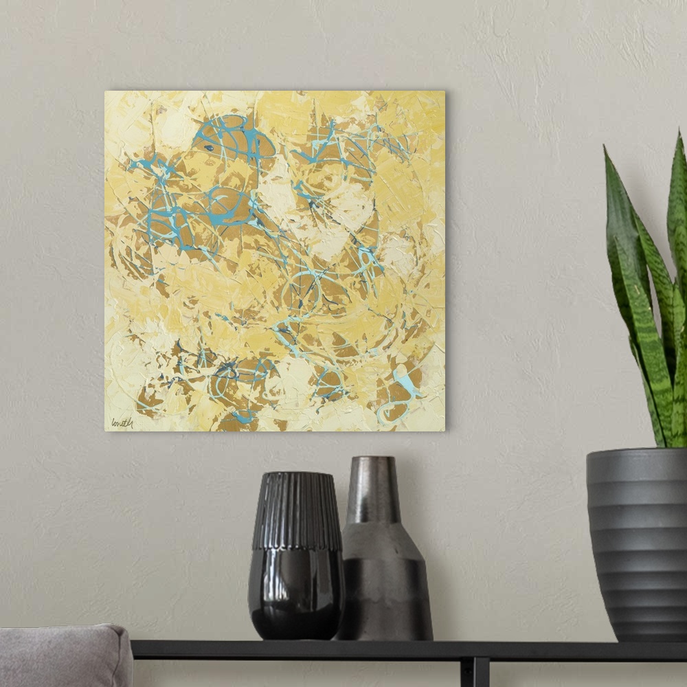 A modern room featuring Abstract contemporary painting in yellow shades with lots of texture.