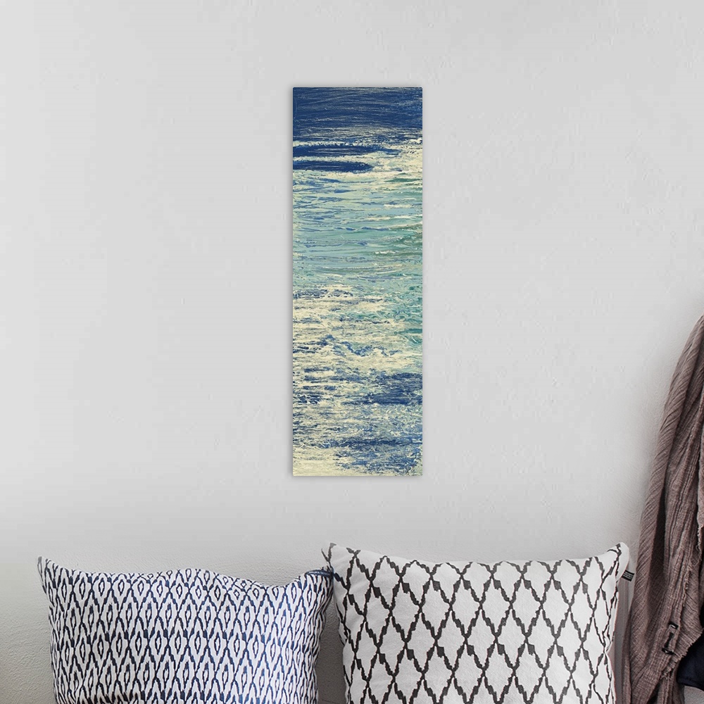 A bohemian room featuring Abstract painting in blue and white resembling ripples on water.
