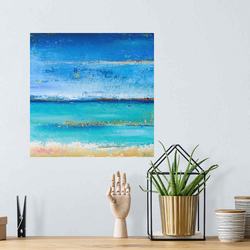 A bohemian room featuring Abstract painting of a blue colorscape resembling the ocean from a beach view.