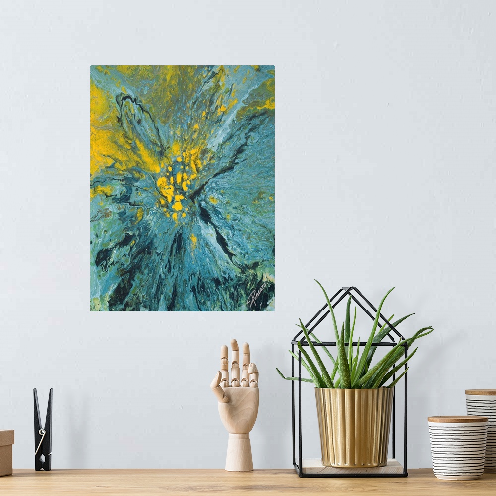 A bohemian room featuring Abstract painting that depicts a blue and yellow paint explosion on to canvas.
