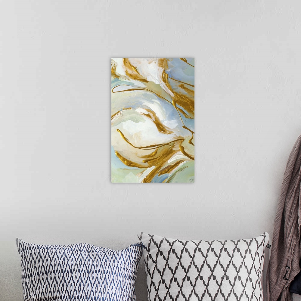 A bohemian room featuring Abstract artwork in white with golden swirls.
