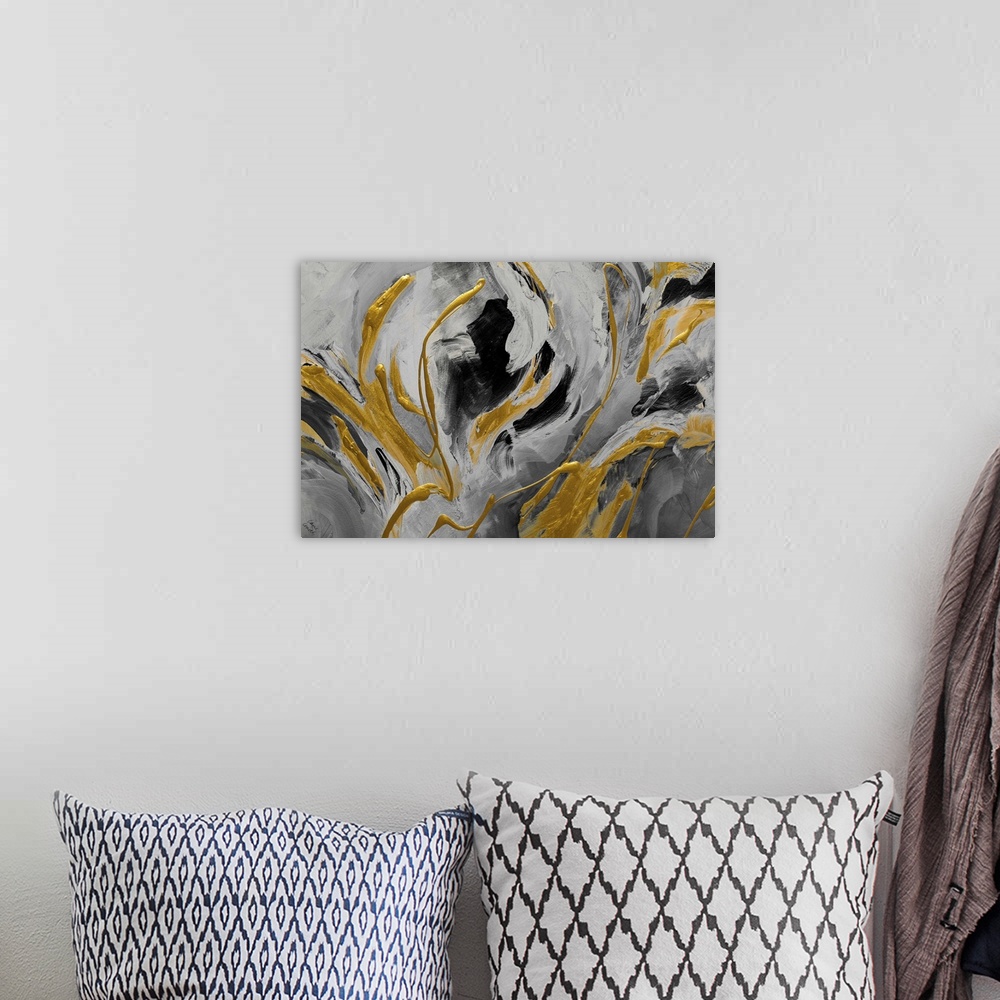 A bohemian room featuring A contemporary abstract painting that has shades of gray and black with thick, bright, gold designs.
