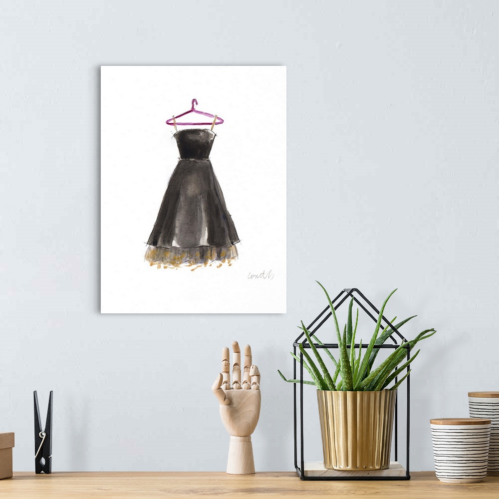 A bohemian room featuring Watercolor painting of a black dress with black and gold frill at the bottom.
