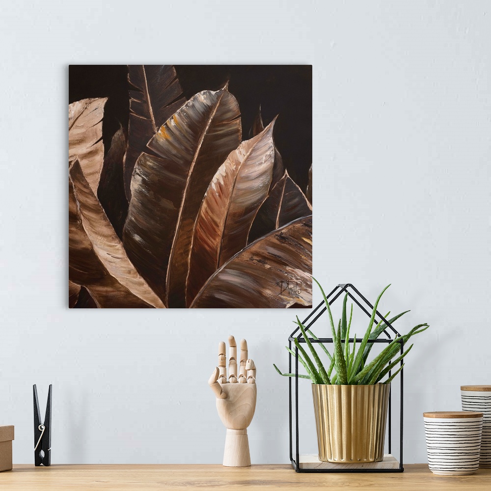 A bohemian room featuring Contemporary painting of big lush tropical leaves.