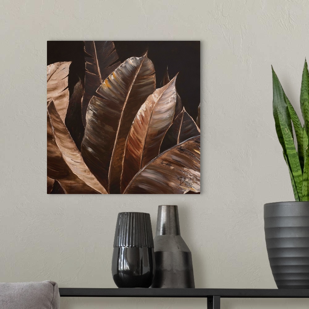 A modern room featuring Contemporary painting of big lush tropical leaves.