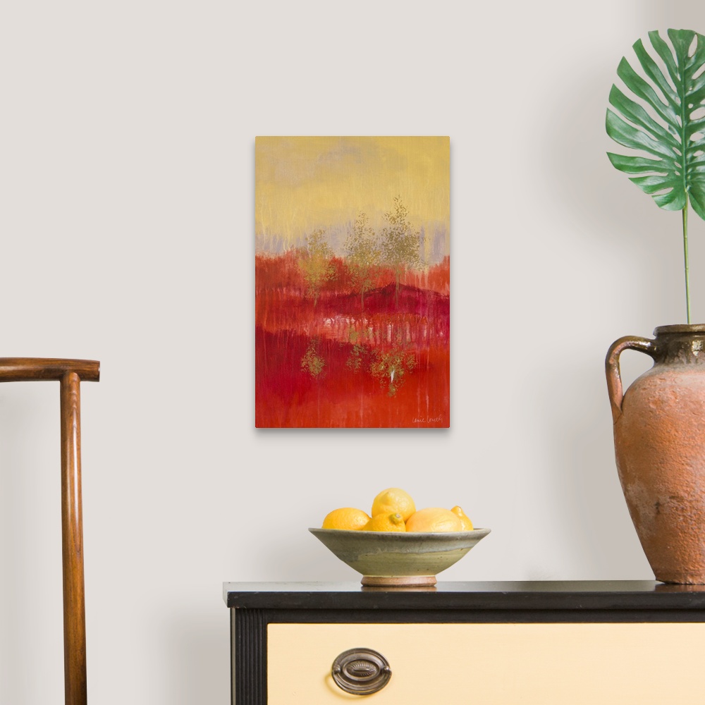 A traditional room featuring Abstract painting of a red and yellow landscape with golden trees.